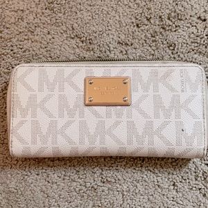 Slightly used white Michael Kors wallet